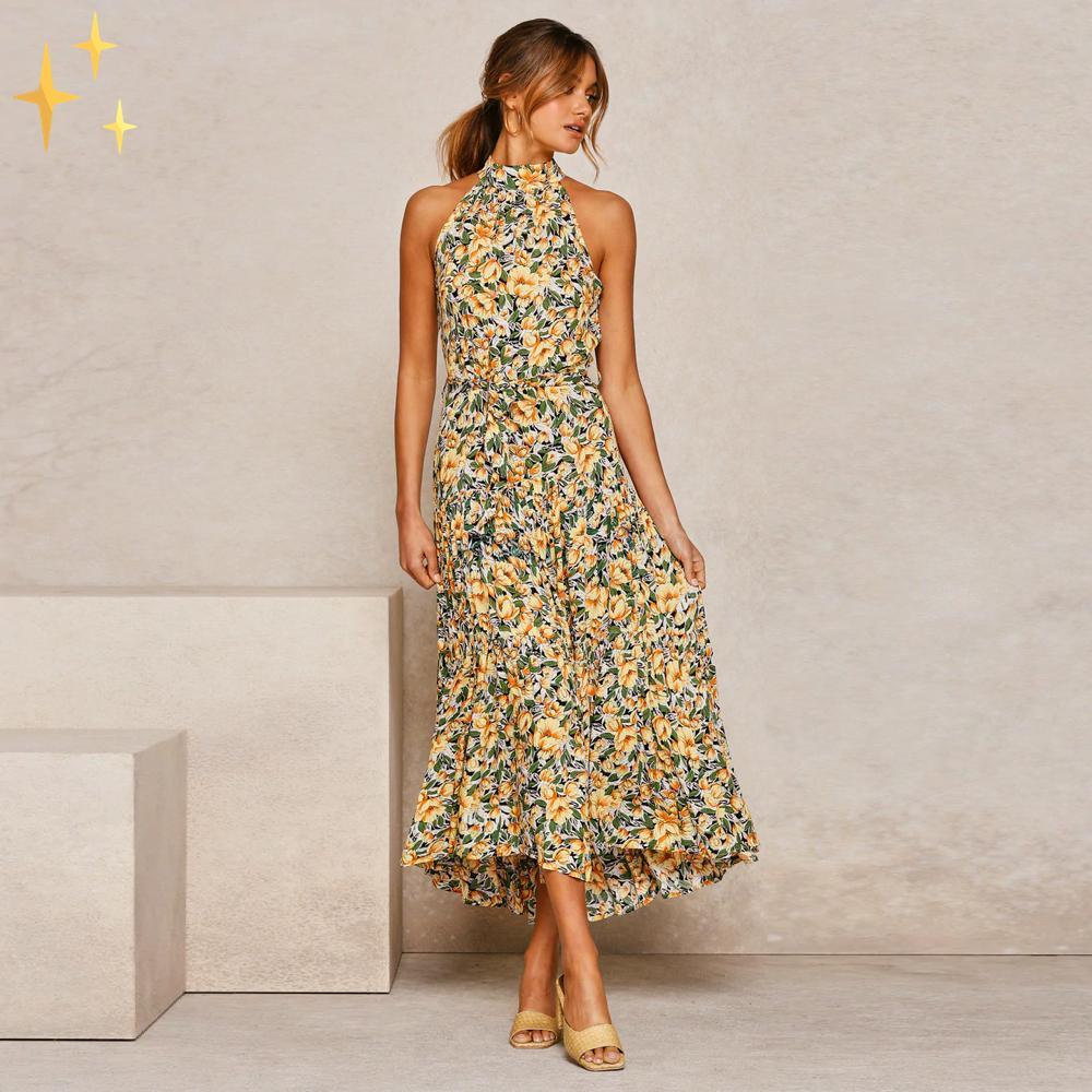 Ella sommarklänning med maxi halter, prickar och midjebälte för en fantastisk feminin look