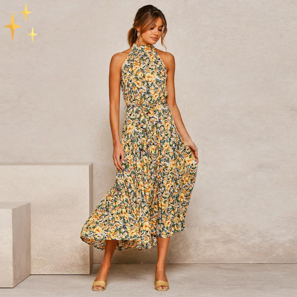 Ella sommarklänning med maxi halter, prickar och midjebälte för en fantastisk feminin look