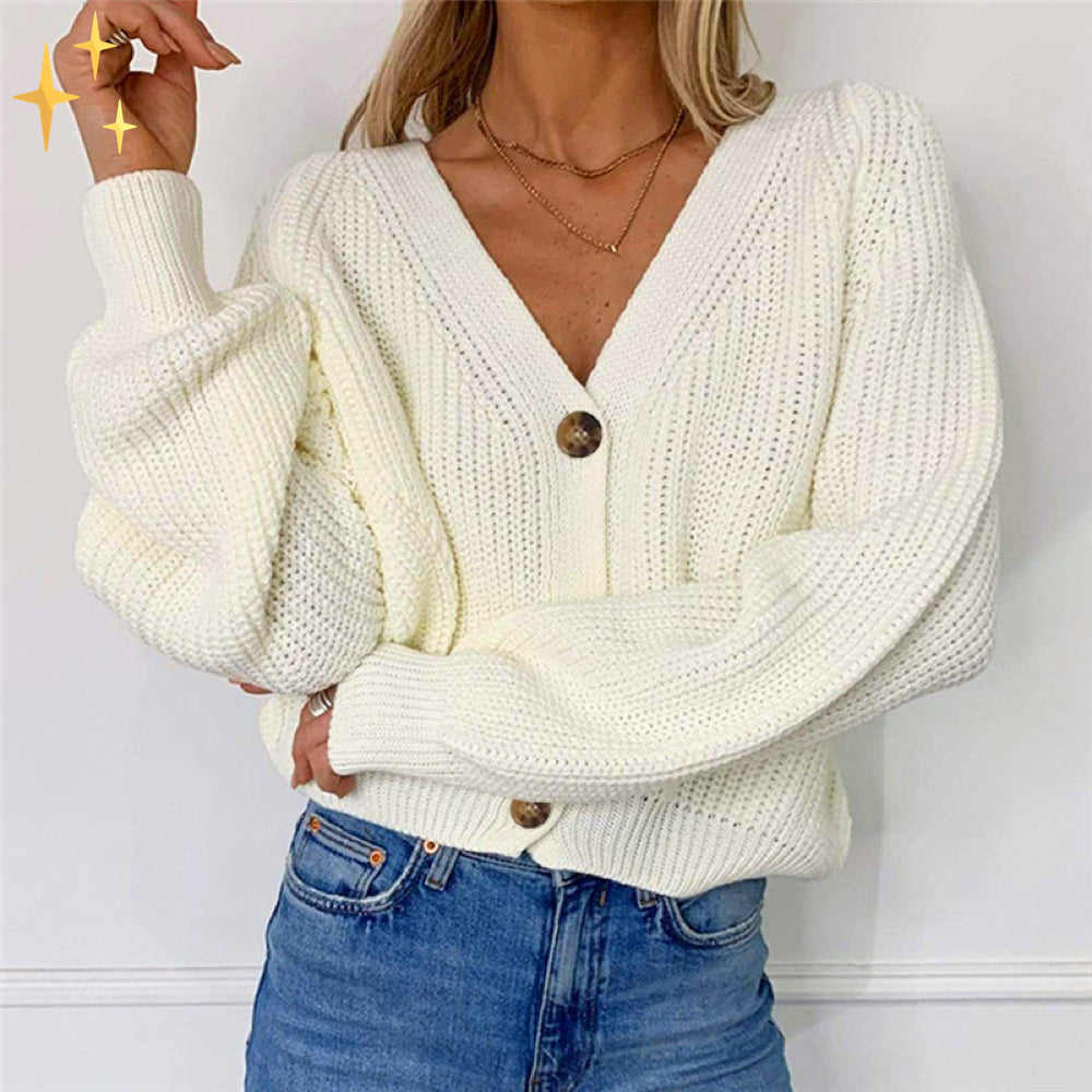 Amber stickad cardigan i överdimensionerad modell med v-ringning och knappar för skön värme