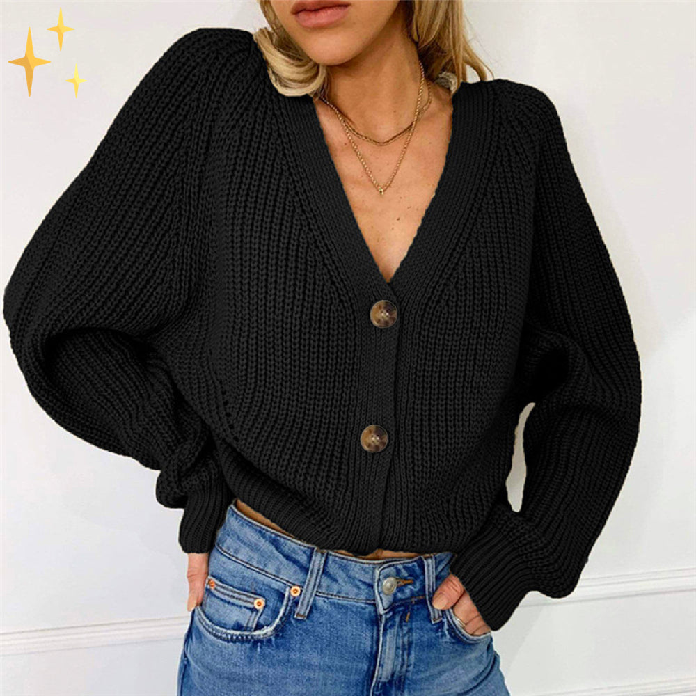 Amber stickad cardigan i överdimensionerad modell med v-ringning och knappar för skön värme