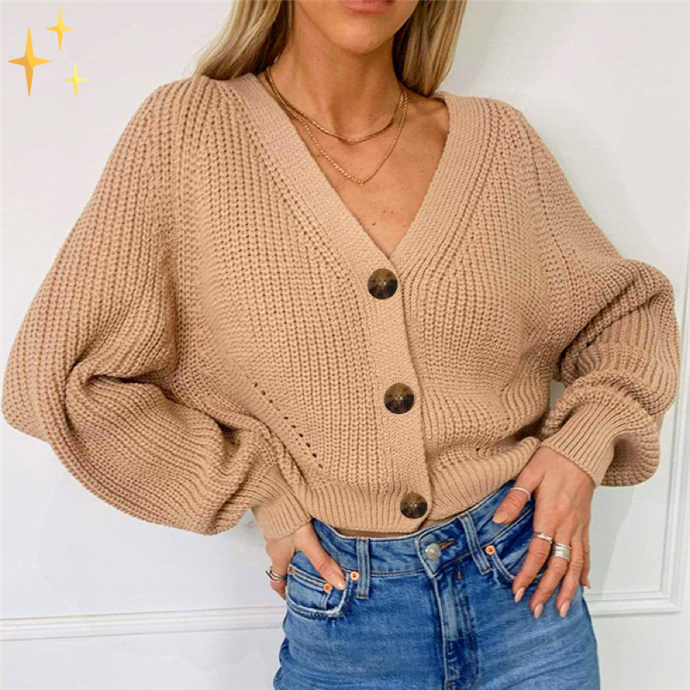 Amber stickad cardigan i överdimensionerad modell med v-ringning och knappar för skön värme